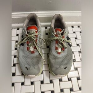 On Running Gray and Orange Athletic Shoes
